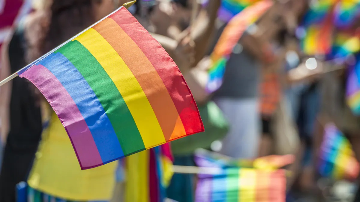 Tucson Gay Times Colorful LGBTQ+ Parade Logo